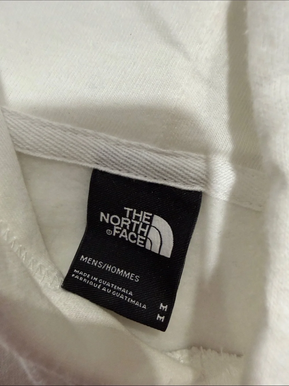 The North Face white zip